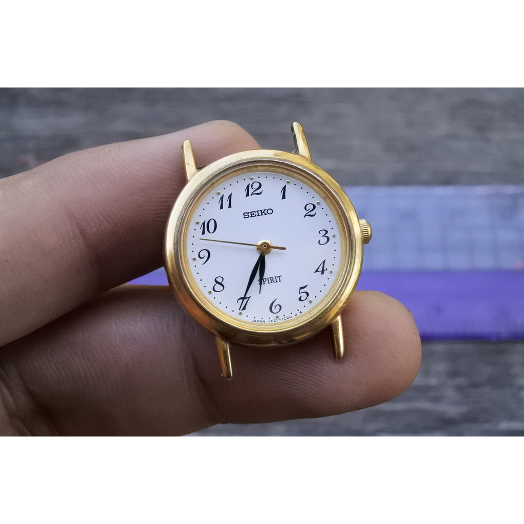 นาฬิกา Vintage มือสองญี่ปุ่น Seiko Spirit 1F21 0H70 White Dial ผู้หญิง ทรงกลม ระบบ Quartz ขนาด25mm