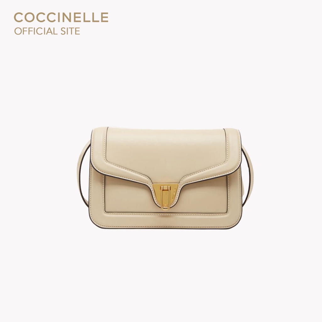 COCCINELLE กระเป๋าสะพายผู้หญิง รุ่น MARVIN TWIST CROSSBODY BAG 150101 สี SILK