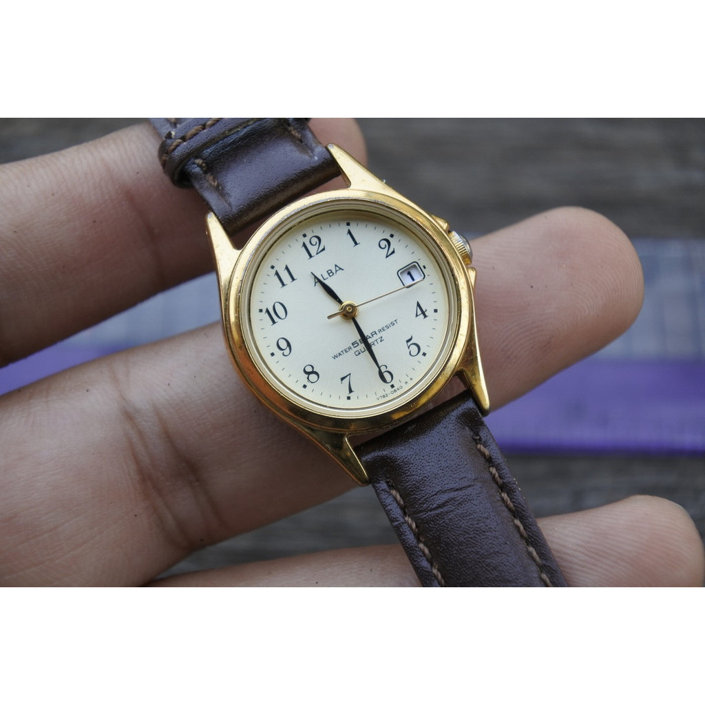 นาฬิกา Vintage มือสองญี่ปุ่น Alba V782 0500 หน้าขาว ผู้หญิง ทรงกลม ระบบ Quartz ขนาด25mm ใช้งานได้ปกติ ของแท้