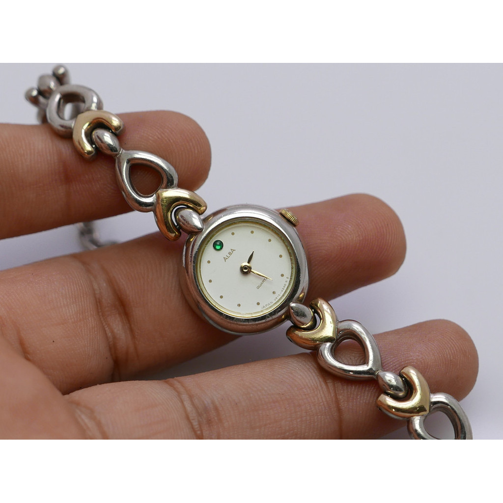 นาฬิกา Vintage มือสองญี่ปุ่น Alba V810 0910 White Dial ผู้หญิง ทรงกลม ระบบ Quartz ขนาด21mm