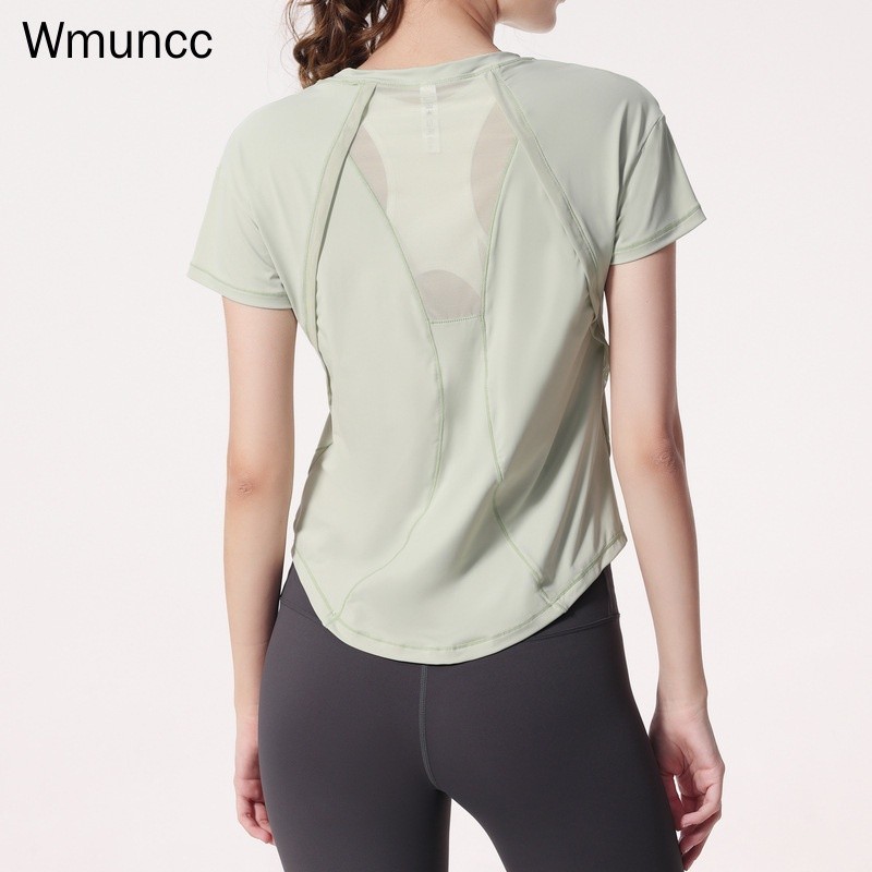 Wmuncc เสื้อกีฬาแขนสั้น ทรงหลวม ระบายอากาศได้ดี เหมาะกับใส่เล่นโยคะ ฟิตเนส วิ่ง สําหรับผู้หญิง