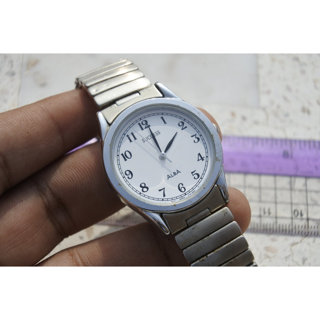 นาฬิกา Vintage มือสองญี่ปุ่น Alba Success V721 6A70 หน้าขาว ผู้ชาย ทรงกลม ระบบ Quartz ขนาด32mm ใช้งานได้ปกติ ของแท้