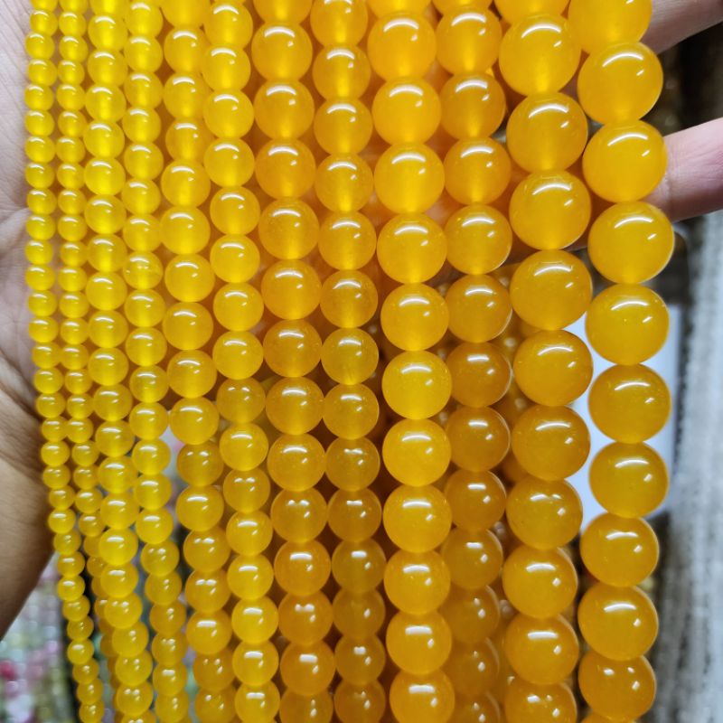 หยกน้ำผึ้งเนื้อกึ่งใส อาเกตน้ำผึ้ง หินเส้นยาวขายส่ง นำไปร้อยเองได้ประมาณ2วงข้อมือ ความยาว37--40cm หินแท้คุณภาพหินมงคล