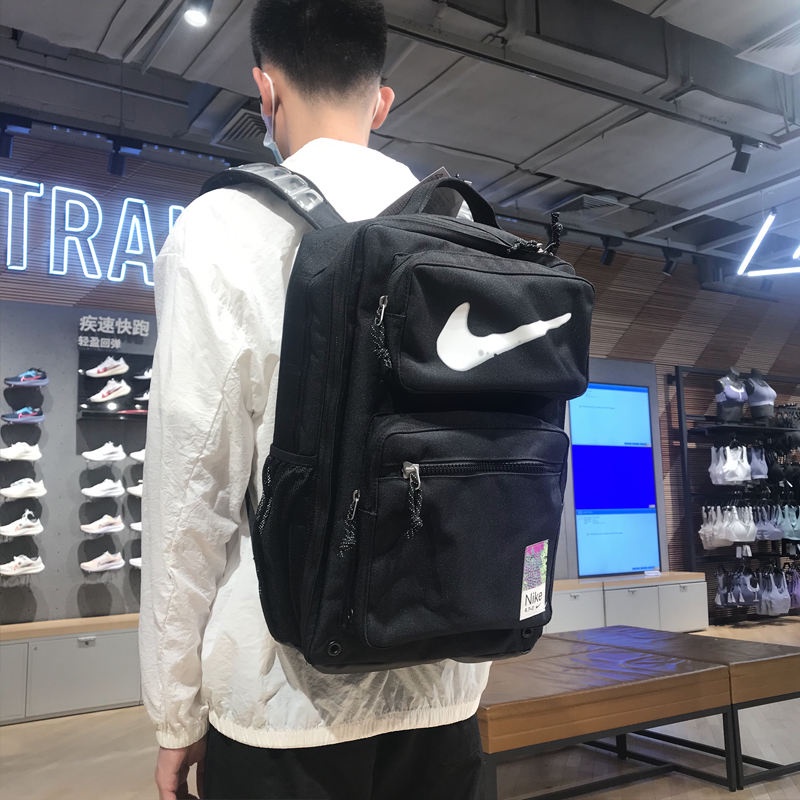 ✕NIKE Nike MAX Travel Sports AIR Air Cushion กระเป๋าเป้สะพายหลังคอมพิวเตอร์กระเป๋านักเรียนนักเรียนสำหรับผู้ชายและผู้หญิง