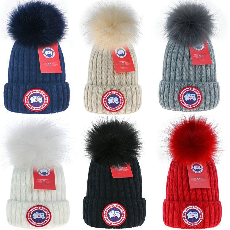 Canada GOOSE หมวกผ้าวูล สไตล์ใหม่ ฤดูใบไม้ร่วง และฤดูหนาว พร้อมลูกบอล สําหรับผู้หญิง หมวกสวมหัว กลางแจ้ง ที่อบอุ่น หมวกลําลอง อเนกประสงค์ str