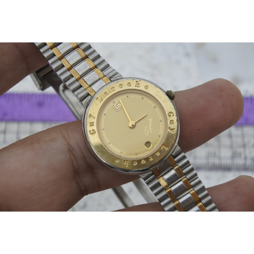 นาฬิกา Vintage มือสองญี่ปุ่น Guy Laroche Swiss Made หน้าสีเหลืองทอง ผู้หญิง ทรงกลม Quartz ขนาด27mm ใช้งานได้ปกติ ของแท้