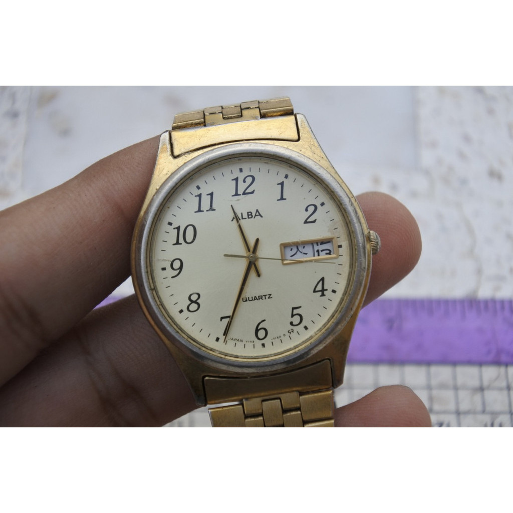 นาฬิกา Vintage มือสองญี่ปุ่น Alba Y143 7010 วันที่คันจิ ผู้ชาย ทรงกลม ระบบ Quartz ขนาด37mm ใช้งานได้ปกติ ของแท้