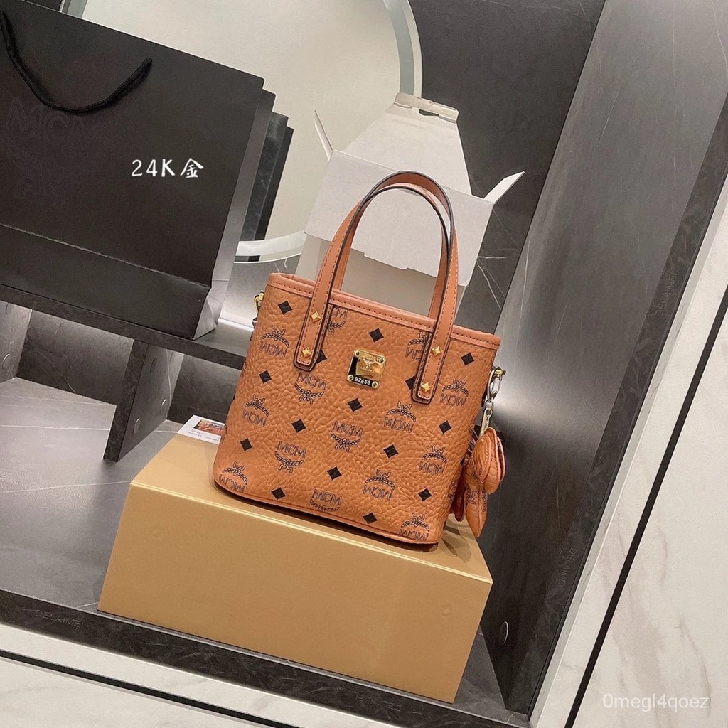 mcm2023ผลิตภัณฑ์ใหม่รุ่นอัพเกรด กระเป๋าถือแบบลำลองสไตล์ชิวๆ