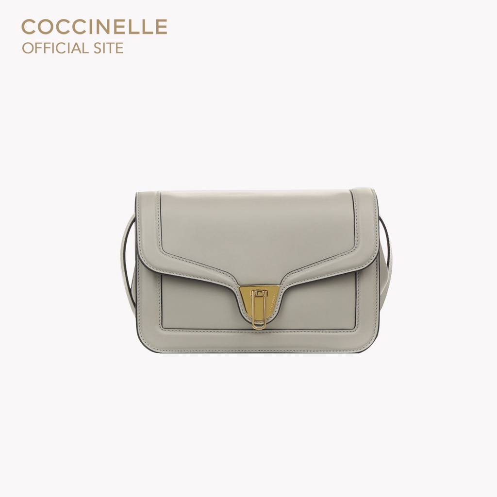 COCCINELLE กระเป๋าสะพายผู้หญิง รุ่น MARVIN TWIST CROSSBODY BAG 150101 สี STONE