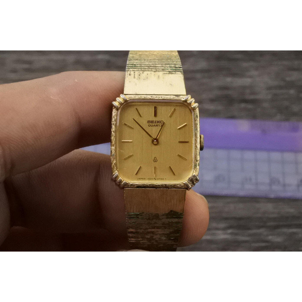 นาฬิกา Vintage มือสองญี่ปุ่น SEIKO ชุบทอง 1400 5480 หน้าสีเหลืองทอง ผู้หญิง ทรง8เหลี่ยม ระบบ Quartz 18mm ใช้งานได้ปกติ