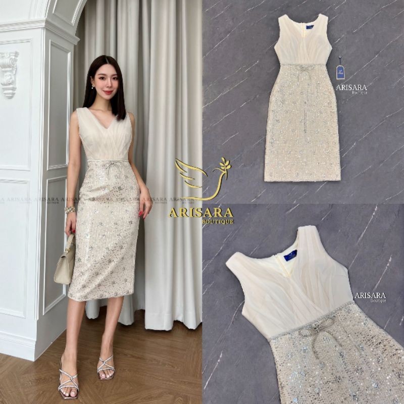 ARISARA เดรสสีครีมทอง ช่วงอกแต่งผ้าซีทรู กระโปรงปักเลื่อม พร้อมเข็มกลัดเพชรรูปโบว์