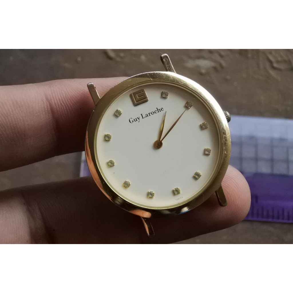 นาฬิกา Vintage มือสองญี่ปุ่น GUY LAROCHE SWISS MADE QUARTZ ผู้หญิง ทรงกลม กรอบทอง หน้าเพชร  33มม