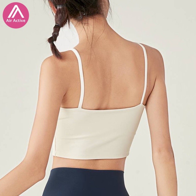 AirActive MotionGrace Rib Tank เสื้อกล้ามโยคะผู้หญิงแบบผ้าร่อง พร้อมแผ่นฟองน้ำถอดได้ ดีไซน์คอรูปตัว U สายบ่าบาง ขอบชายเสื้อกว้าง สวยงามและใส่สบาย เหมาะสำหรับโยคะ วิ่ง และฟิตเนส