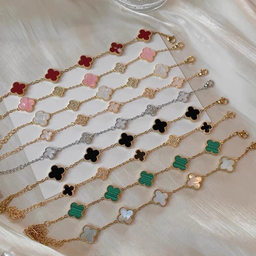 sparklyสร้อยข้อมือFour Leaf Clover สร้อยข้อมือหรูหราสร้อยข้อมือระดับไฮเอนด์ Niche Zircon สร้อยข้อมือดอกไม้