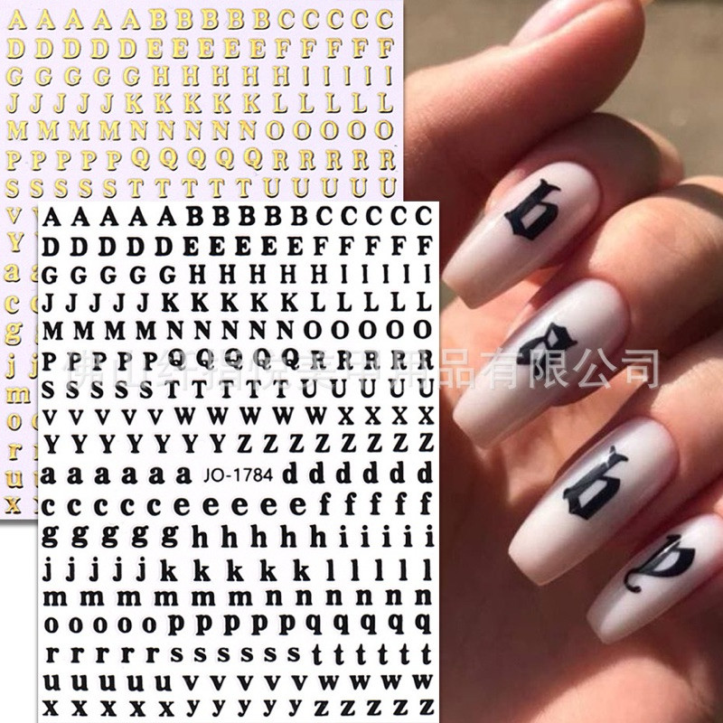 สติกเกอร์ติดเล็บลายตัวอักษรมีสี่สีให้เลือก ใช้สำหรับติดเล็บปลอมหรือกิ๊ฟช็อป สินค้าพร้อมส่งในไทย แผ่นละ 9 บาท