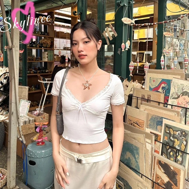 🌟24Hพร้อมส่ง🌟เสื้อครอปแขนสั้น ดีเทลโบว์ ขอบลูกไม้ มีฟองน้ำในตัว SL