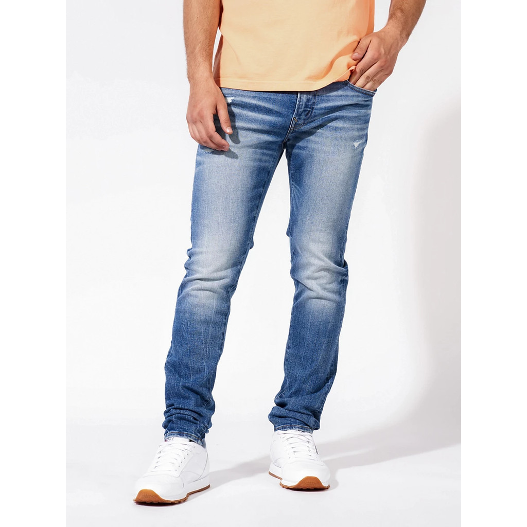 American Eagle กางเกงยีนส์ผู้ชาย MEDIUM WASH W/ BULLETHOLES SKINNY FIT สี MEDIUM WASH - 011-6307-936