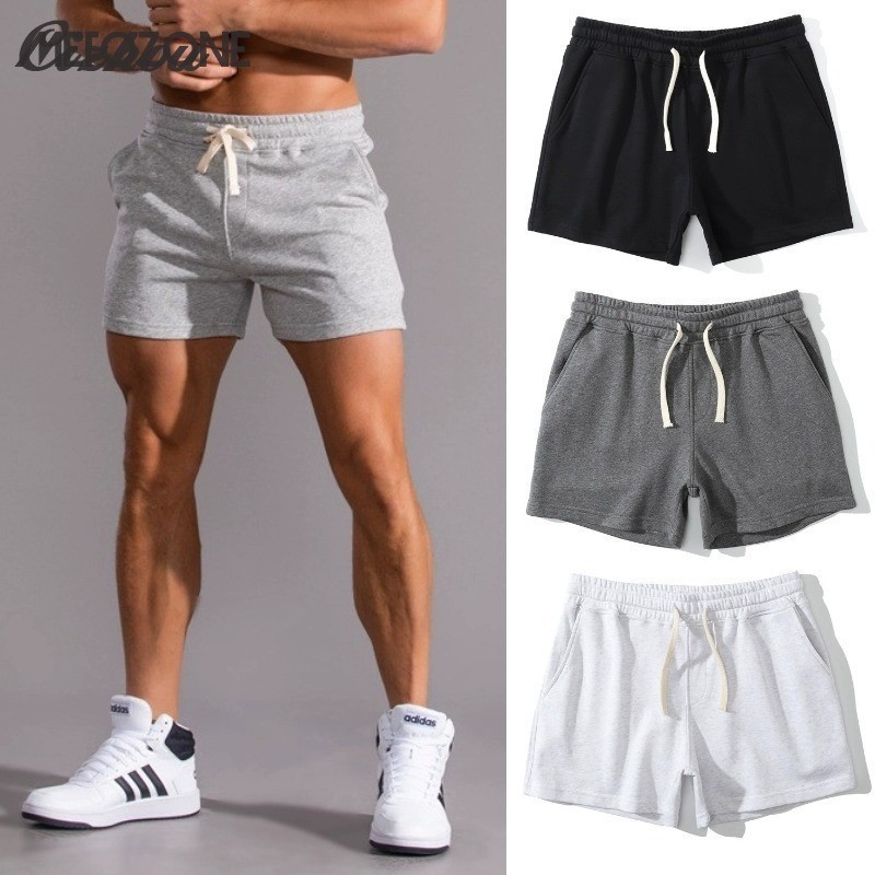 ไร้สาระ กางเกงขาสั้นลําลองผ้าฝ้ายยืดสีดําสีเทาเหมาะกับการวิ่งเล่นกีฬาออกกําลังกายกีฬาผู้ชาย