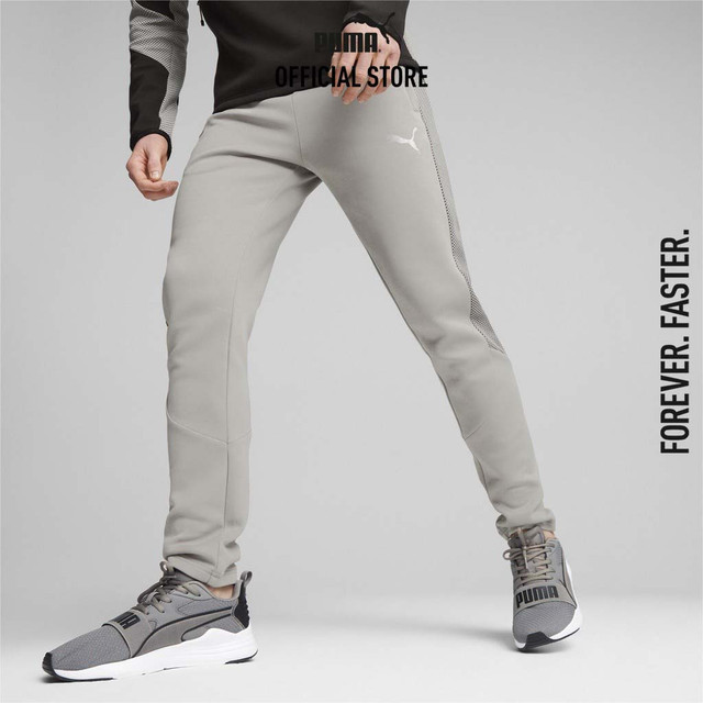 PUMA BASICS - กางเกงวอร์มผู้ชาย EVOSTRIPE สีเทา - 67593214