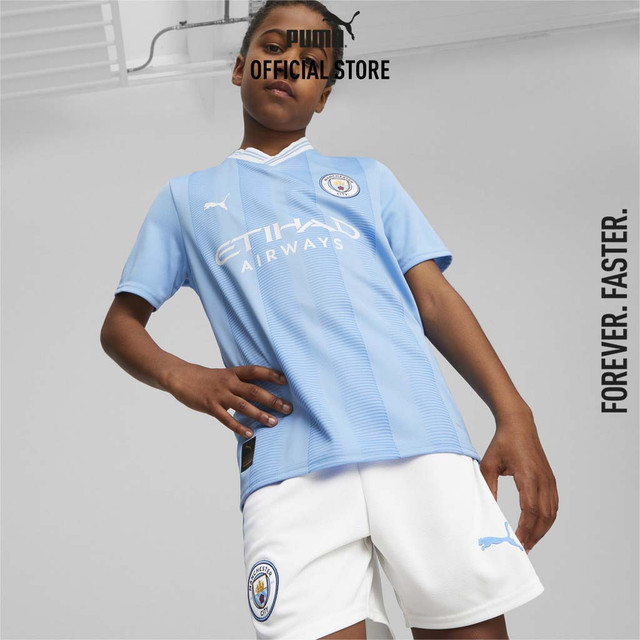 PUMA FOOTBALL - เสื้อเจอร์ซีย์เด็กโตจำลองจากเสื้อชุดเหย้าของทีม Manchester City F.C สีฟ้า - 77044101