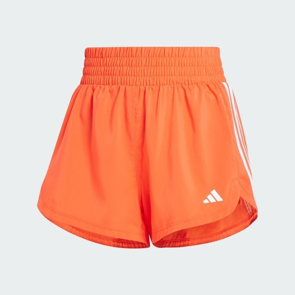 adidas เทรนนิง กางเกงเทรนนิงขาสั้นผ้าทอเอวสูง Pacer 3-Stripes ผู้หญิง สีส้ม IS1667