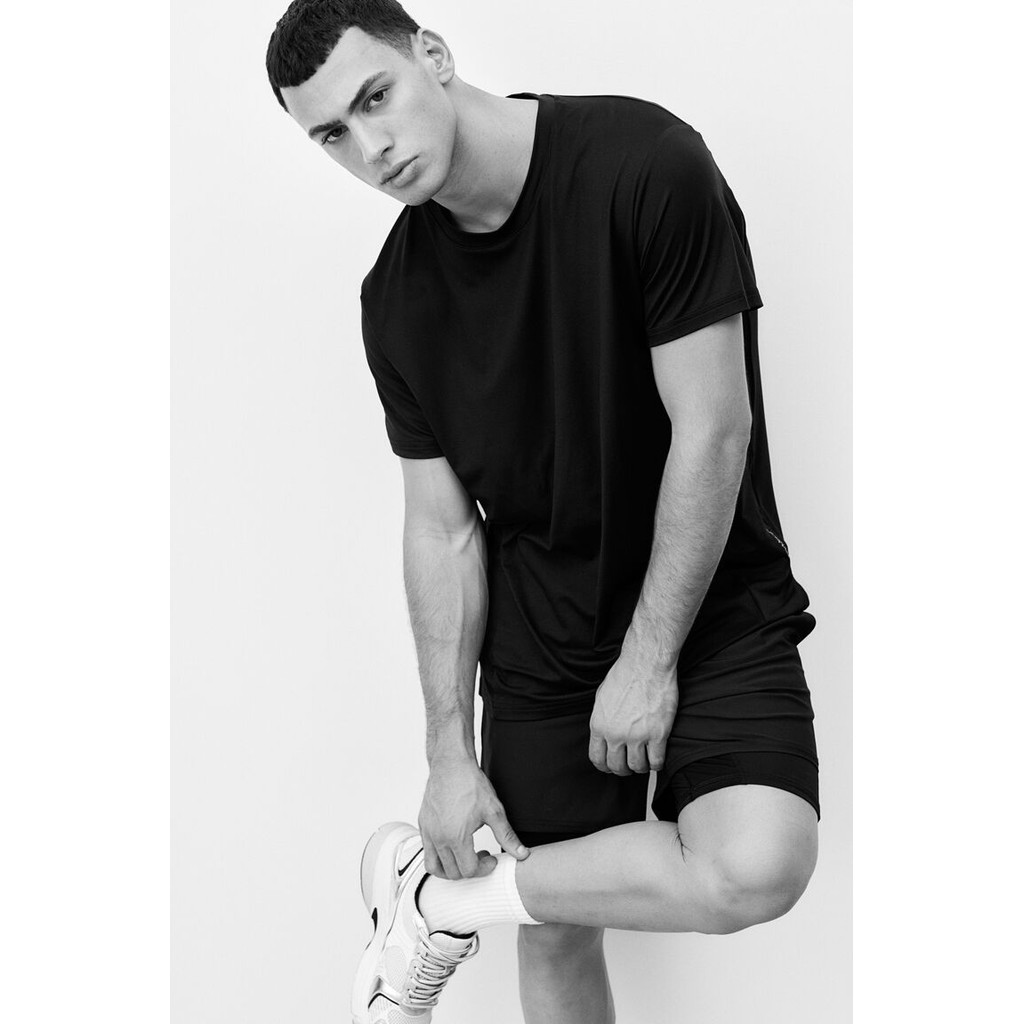 H&M(เอชแอนด์เอ็ม) เสื้อกีฬาแบบ Regular Fit ใน DryMove™ ผู้ชาย 1256521_1