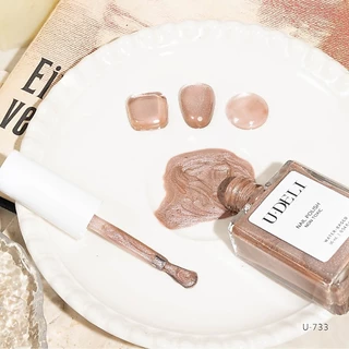 U-733 สีแคทอายแมจิค (ไม่อบ) U-DELI Magic Cat Eye Vegan สีลูกแก้ว สีทาเล็บกึ่งเจล โทนสีสวย ดึงเงาง่าย