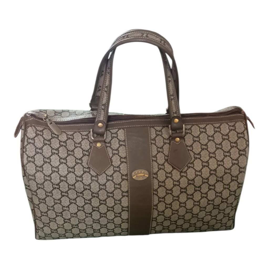 Gucci Boston 45 used bags like new good condition and good price original brands