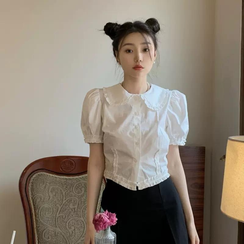 เสื้อเชิ้ตแขนสั้นผู้หญิงสไตล์เกาหลีสำหรับฤดูร้อน คอปกปีเตอร์แพน แขนพอง ทรงเข้ารูป W704