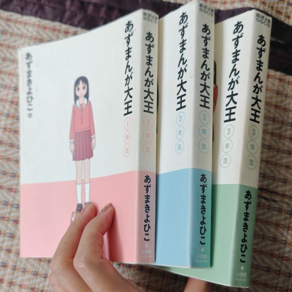 การ์ตูน (มังงะ) "Azumanga Daioh" (あずまんが大王) หรือที่ในไทยรู้จักกันในชื่อ "โรงเรียนป่วน นักเรียนเป๋อ" K