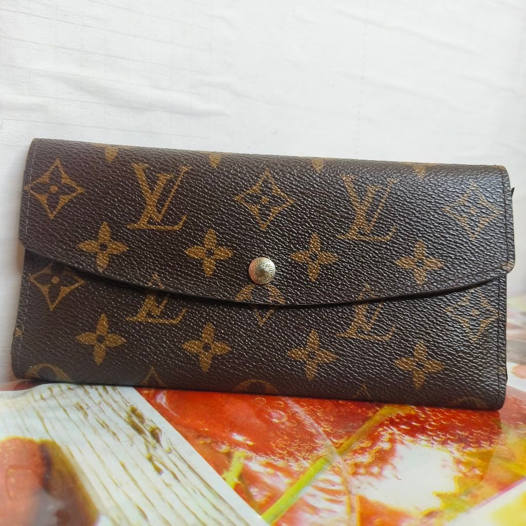 กระเป๋าสตางค์มือสอง LV monogram 3 พับ **มีตำหนิ