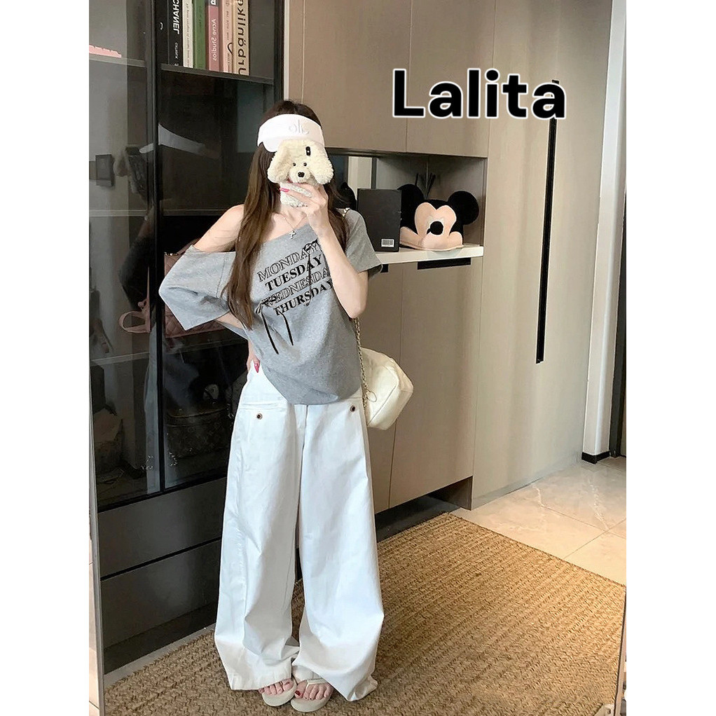 พร้อมส่ง โบว์ พิมพ์ลาย มีสีให้เลือกมากมาย เสื้อปาดไหล่ เสื้อยืดผู้หญิง ทรงหลวม เข้ากับทุกสไตล์ได้   Lalita