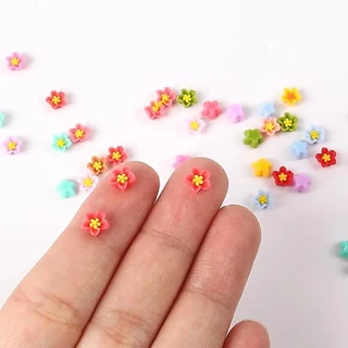 100ชิ้นที่มีสีสันมินิผสมดอกไม้แบนกลับเรซิ่นดอกไม้การ์ตูน ทําเอง เครื่องประดับเสน่ห์หัตถกรรมตกแต่งสาวตกแต่งเล็บ