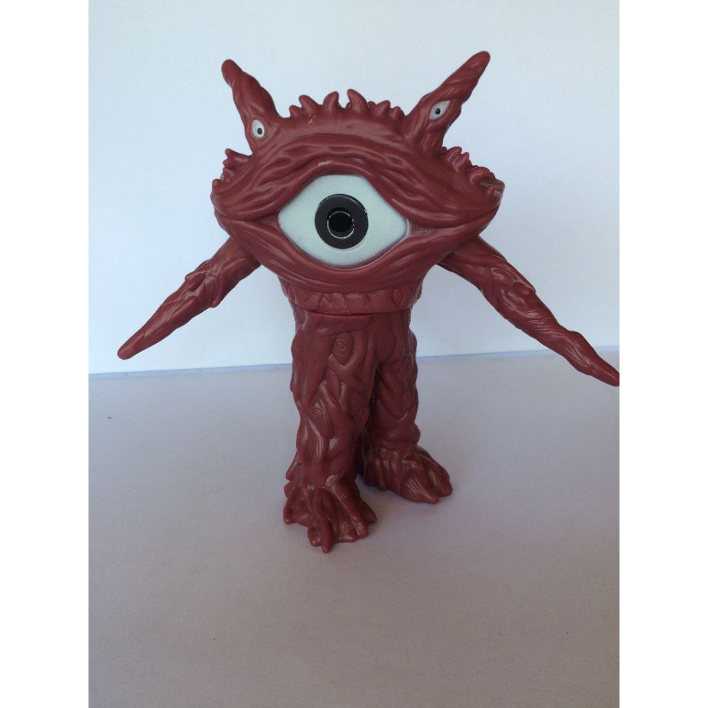 strange cyclops creature figurine