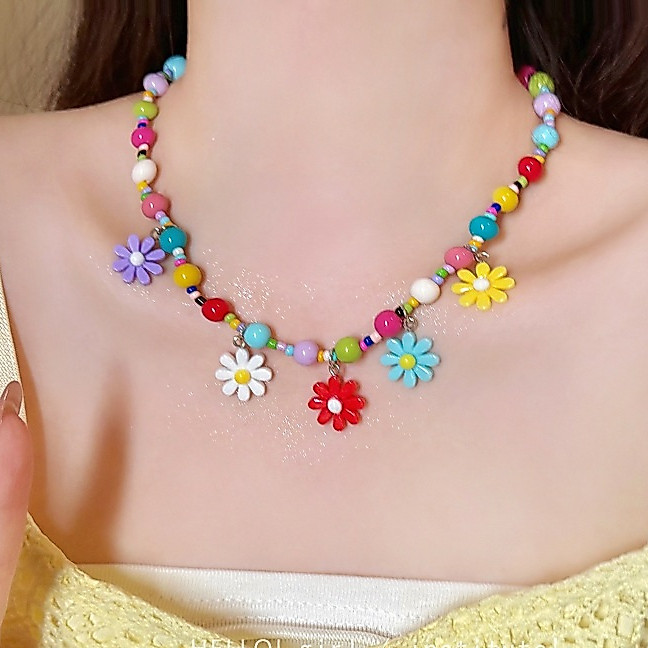 ลูกปัดข้าวดอกไม้ที่มีสีสันพู่สร้อยคอ โดปามีน อารมณ์หวานเสื้อกันหนาวโซ่อุปกรณ์เสริมสบายๆและหลากหลาย