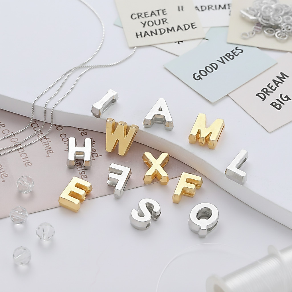 St.kunkka 10-20g ลูกปัดตัวอักษร ABS สีทอง/เงิน รูแบน อะไหล่ตัวอักษร A-Z สำหรับทำสร้อยข้อมือชื่อ DIY งานฝีมือ — صورة 2