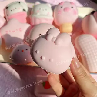 สกุชชี่ ​​ของเล่นกดสีชมพูน่ารัก ของเล่นเด้งช้าหลังกด ของเล่น SoftSqueeze