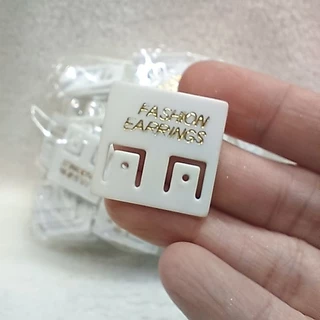 แป้นต่างหู แพค 100 ชิ้น พิมพ์ Fashion earrings มีสีขาวและดำ