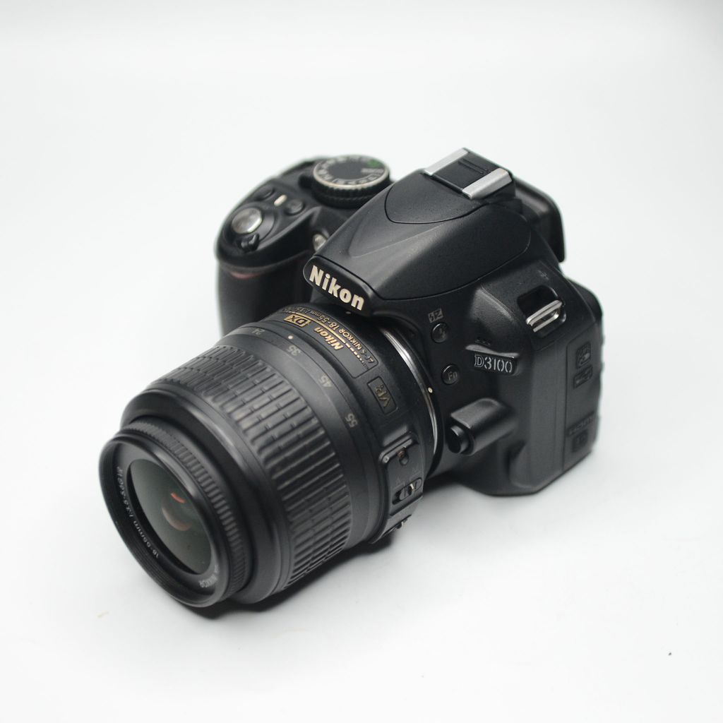 Nikon D3100 + 18-55mm