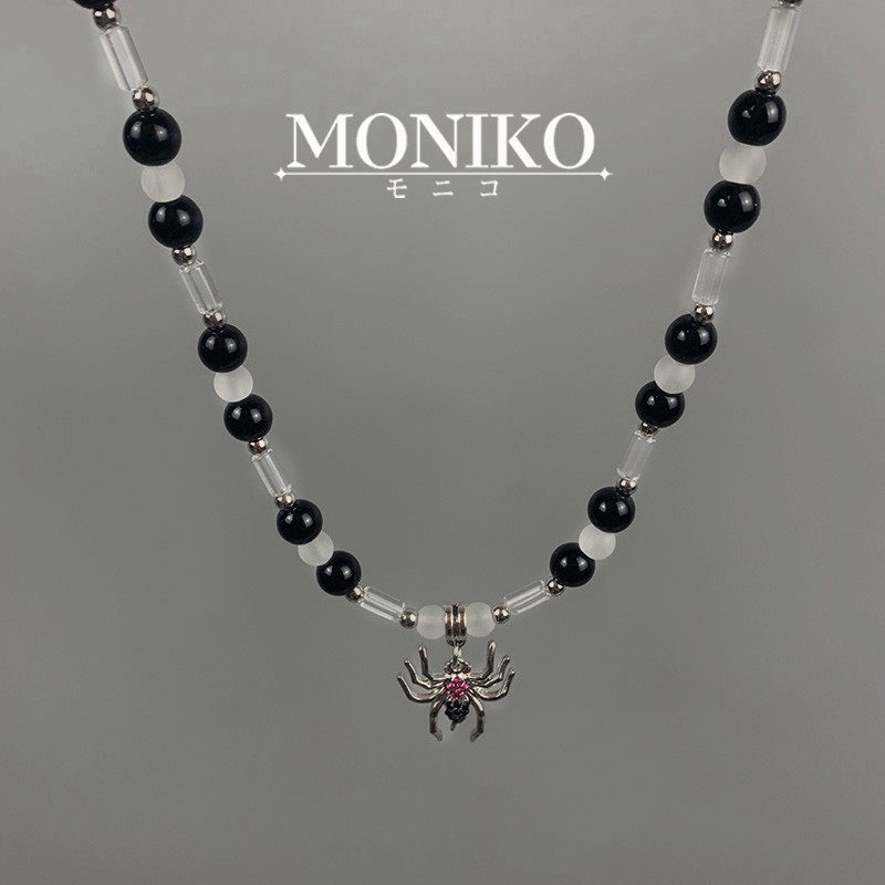 MONIKO สร้อยคอลูกปัด จี้แมงมุม ประดับเพชร สีดํา สไตล์ฮิปฮอป สําหรับผู้ชาย และผู้หญิง