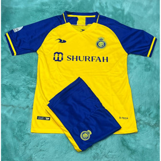 เสื้อกีฬา ทีมอัล-นาสเฃอร์ Al Nassr ปีล่าสุด2022/23 แขนสั้น ชุดฟุตบอล ชุดผู้ใหญ่ ได้ทั้งชุด(เสื้อ + กางเกง)  ใหม่ล่าสุด