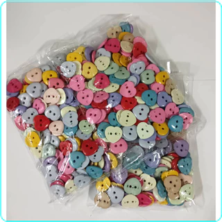 กระดุมรูปหัวใจ 2 รู คละสี 15 มิล งาน DIY งานฝีมือเย็บปักถักร้อย เสื้อผ้า ตุ๊กตา ตกแต่ง