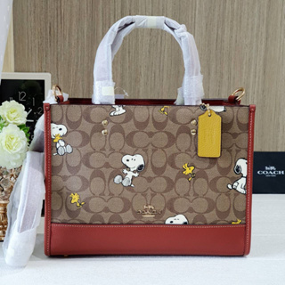 💚แท้💯 พร้อมส่ง💚Coach CE862 X Peanuts Dempsey Carryall In Signature Canvas  With Snoopy Woodstock Prin