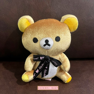 ตุ๊กตา Rilakkuma ขนเงาวิ้ง ผูกโบว์ ขนาด 12 x 14 ซม.  * มือสอง มีตำหนิ สภาพดี ซักแล้ว