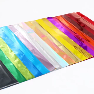 กระดาษห่อของขวัญ ฟอยล์เงา สีล้วน/ลาย กระดาษมันเงา กระดาษเลเซอร์ แพค 5แผ่น/10แผ่น ขนาด 50*70ซม. ฟอย กระดาษสี US.Station