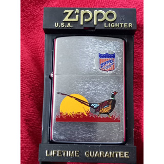 ZIPPO ANIMAL SERIES ผลิตปี1991 สีเงิน ผิวโครเมี่ยมขัดด้าน ลายแบบสกรีนรูปไก่ฟ้า  ของใหม่ไม่ผ่านการใช้งาน เก็บเก่า