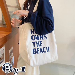 bag(BAG1783) กระเป๋าผ้าใบใหญ่ NOBODY OWNS THE BEACH ผ้าแคนวาสมี4สาย