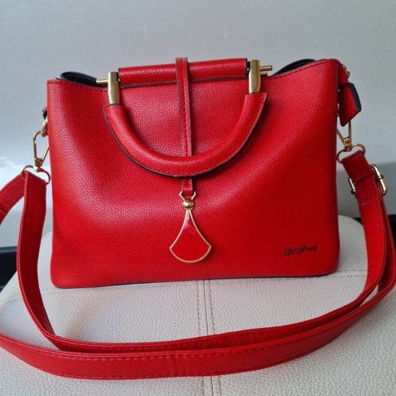 กระเป๋าสะพาย TW Simply สีแดงสดออกส้ม มือสอง