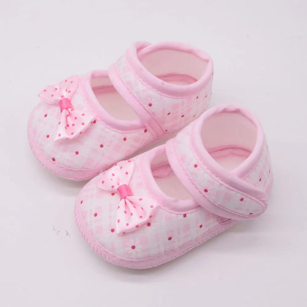 Babyonline(X084)2R1 รองเท้าสำหรับเด็กมีกันลื่นลายดอกแต่งโบว์