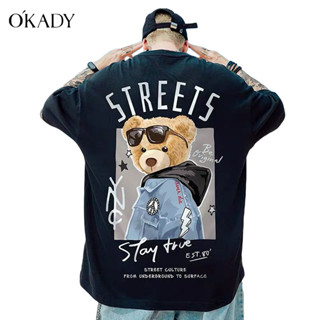 OKADY【จัดส่งที่รวดเร็ว】เสื้อยืดคอกลม เสื้อยืดแฟชั่น ใส่ได้ทั้งผู้ชาย-ผู้หญิง ใหม่ล่าสุด 2566